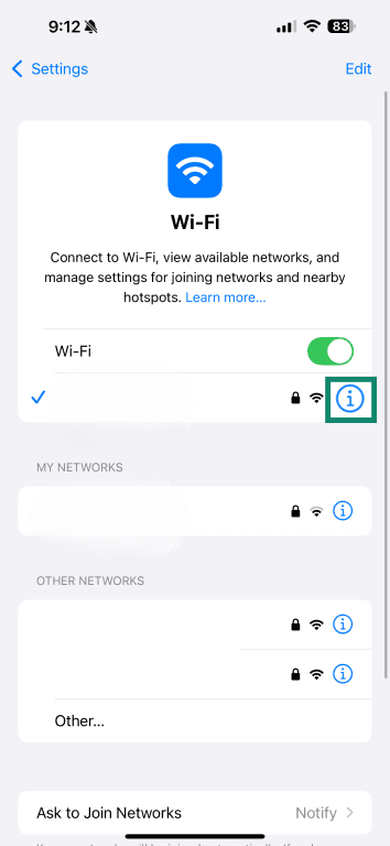 iOS Wi-Fi settings screen with information button highlighted.